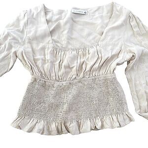 O.VANCA top with full sleeves elastic waist band . Size S. Cotton/Poly